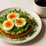 plated jammy eggs on toast with chili flakes