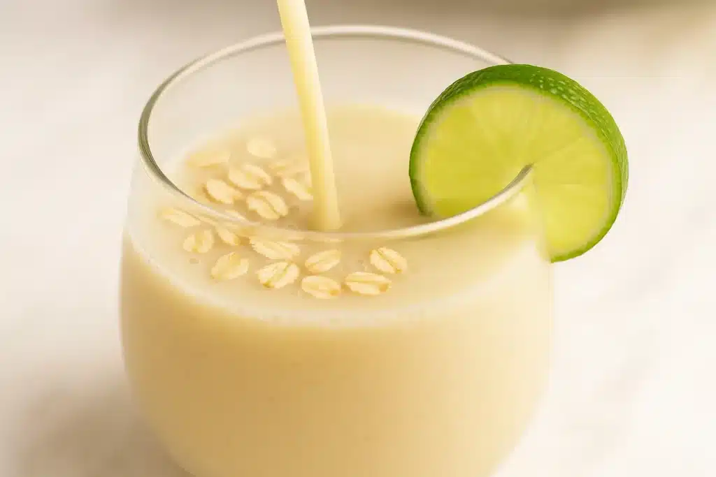 Pouring and assembling a natural Ozempic drink in a glass