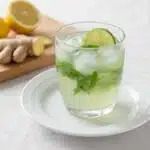 Served Japanese Mounjaro drink in a clear glass with lemon and ginger