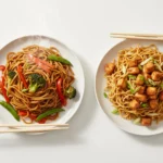 Plated chow mein and lo mein side by side