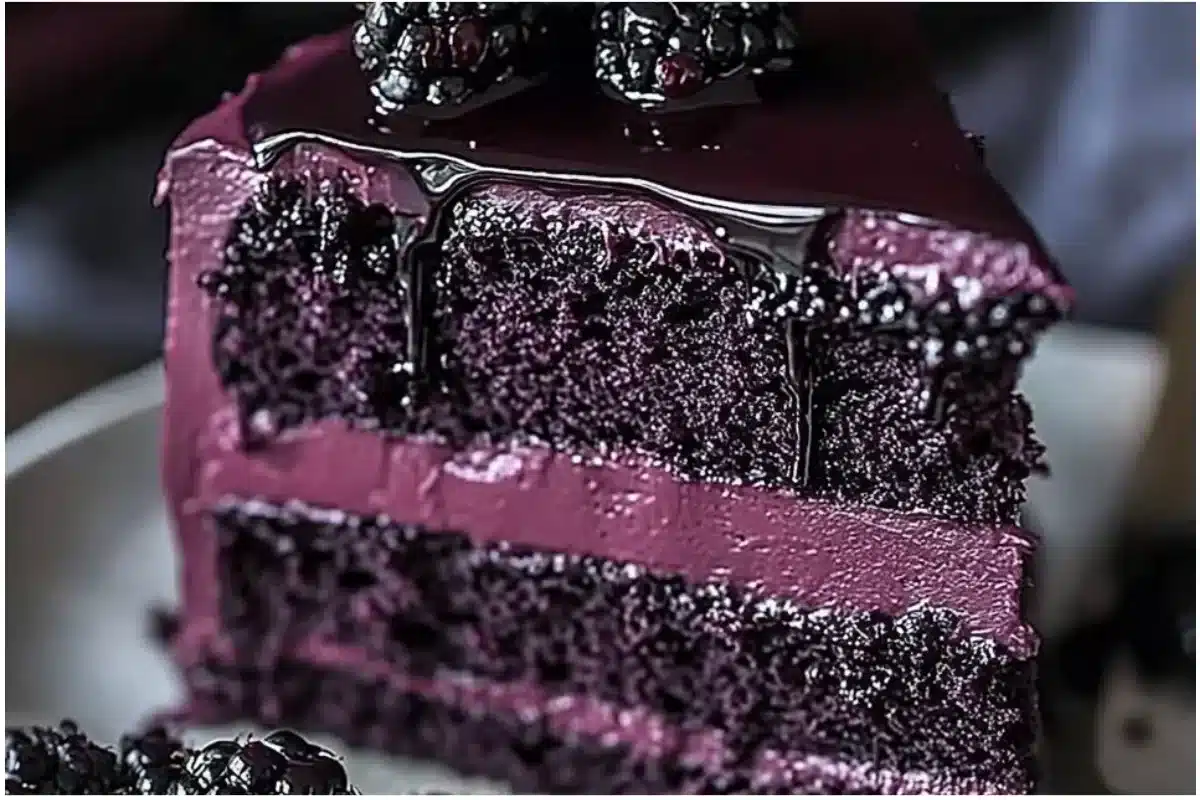 Blackberry Velvet Cake with rich dark layers and blackberry frosting