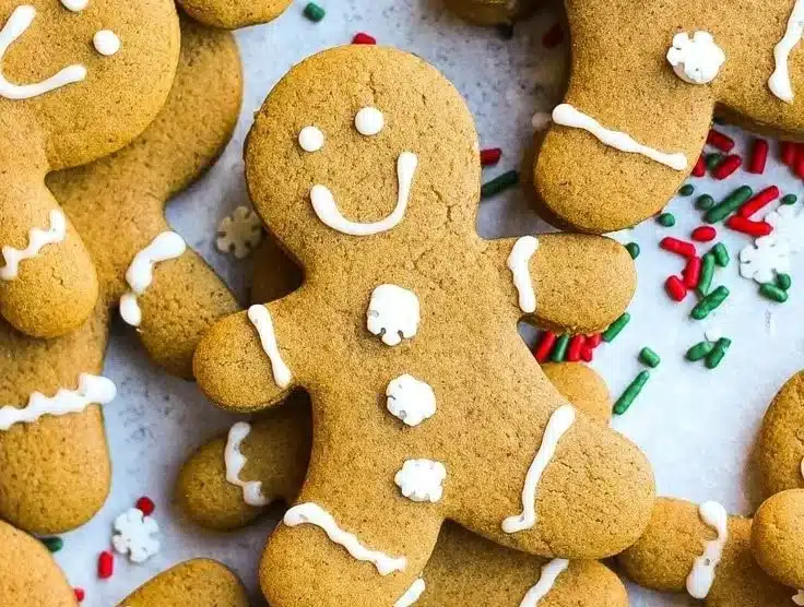 Soft and chewy gingerbread men cookies decorated with icing