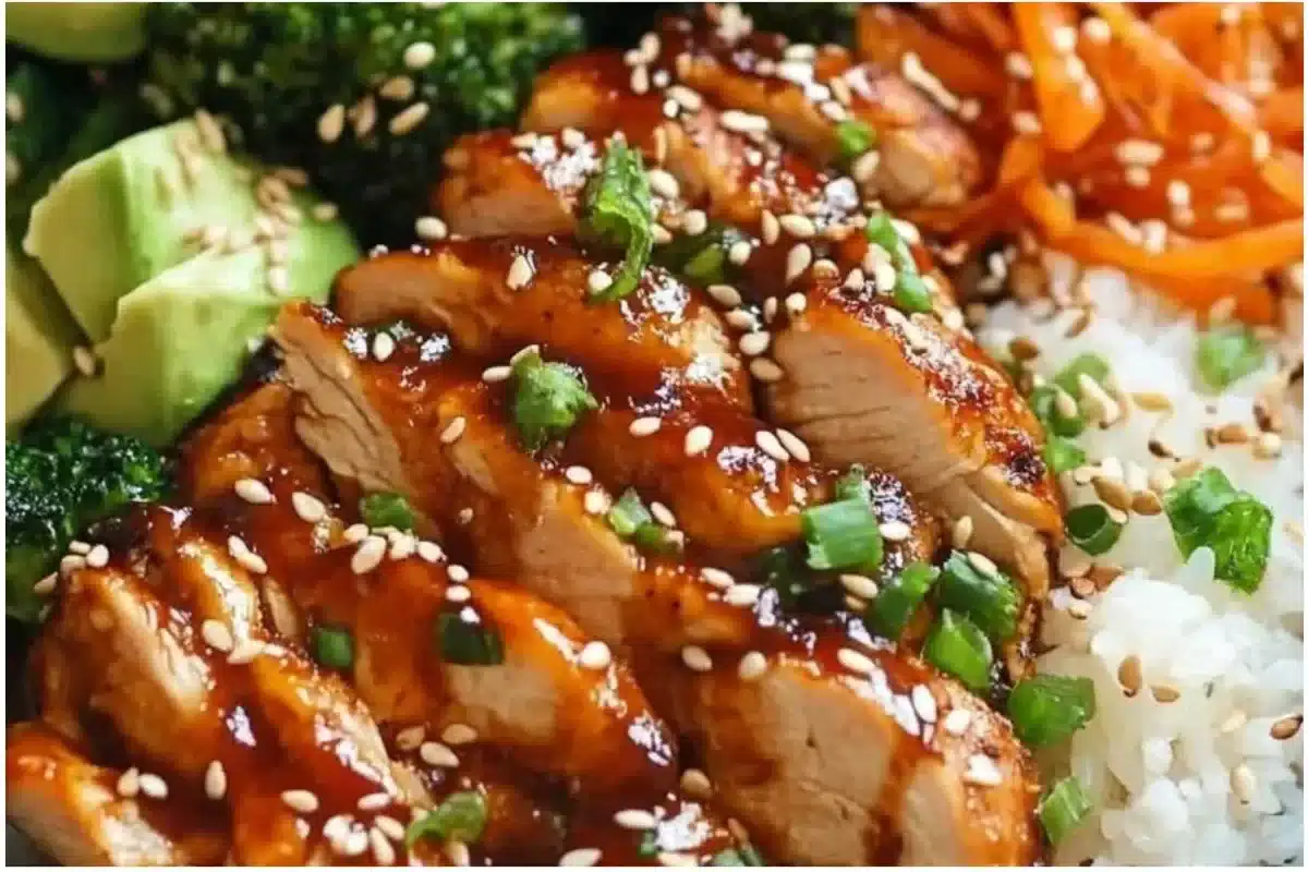 Delicious sticky chicken rice bowls served in a vibrant dish.