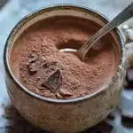 Delicious homemade keto hot chocolate mix in a mug with chocolate sprinkles