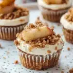Apple Crisp Cheesecakes a perfect blend of creamy cheesecake 5 thanksgiving apple crisp mini cheesecakes 2026 01 03 155421 683x1024 1