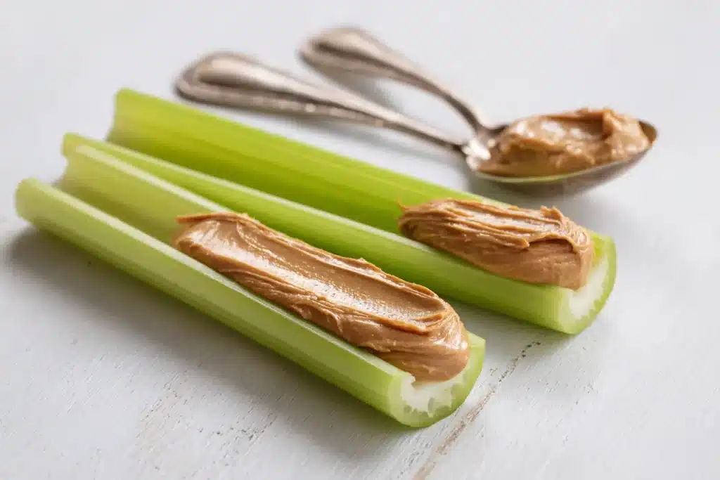 Celery with Peanut Butter Recipe: The Perfect 5-Minute Healthy Snack 14 Portion controlled celery with peanut butter showing healthy serving size