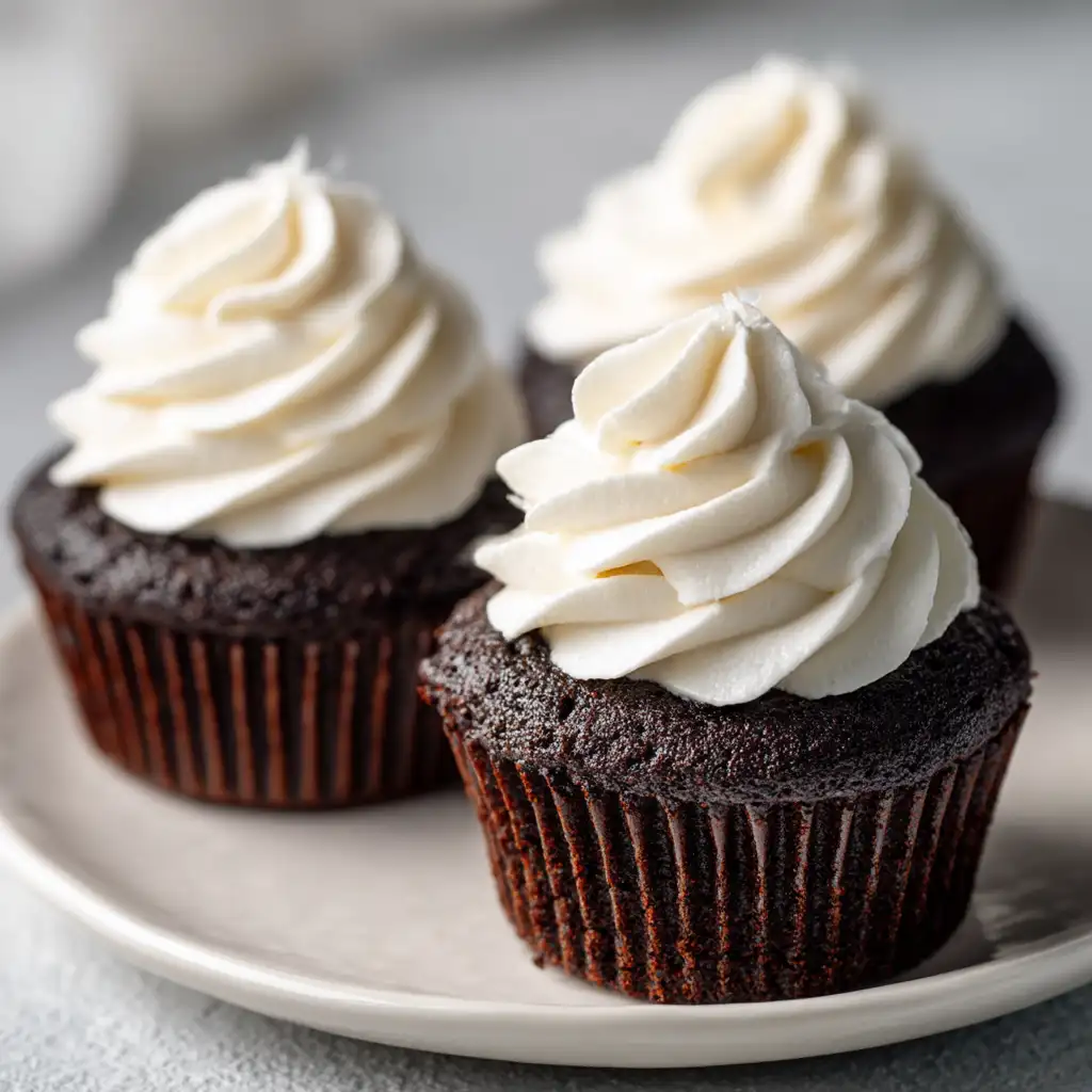 Easy 5 Ingredient Vegan Chocolate Cake (So Moist!) 19 Vegan chocolate cupcakes made from 5 ingredient cake batter with coconut cream on top