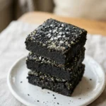 Black Sesame Dessert: 7 Easy Recipes Your Family Will Love 14 black sesame dessert brownies stacked for Pinterest share tasteourdish