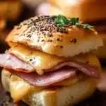 Delicious ham and cheese sliders served on a platter